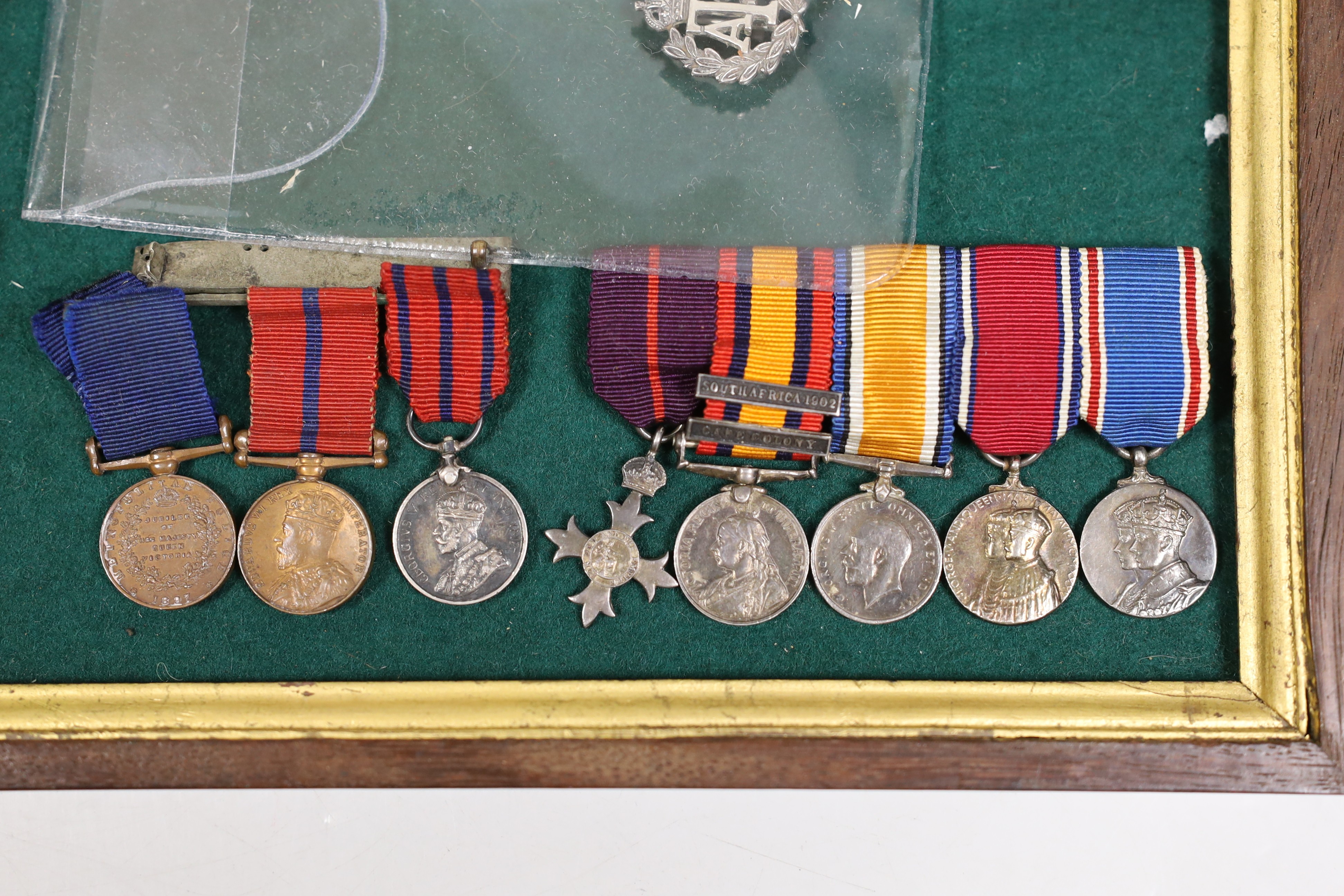 A collection of miniature medals, Victoria to George VI, Civil Defence and Edward VI's military buttons etc